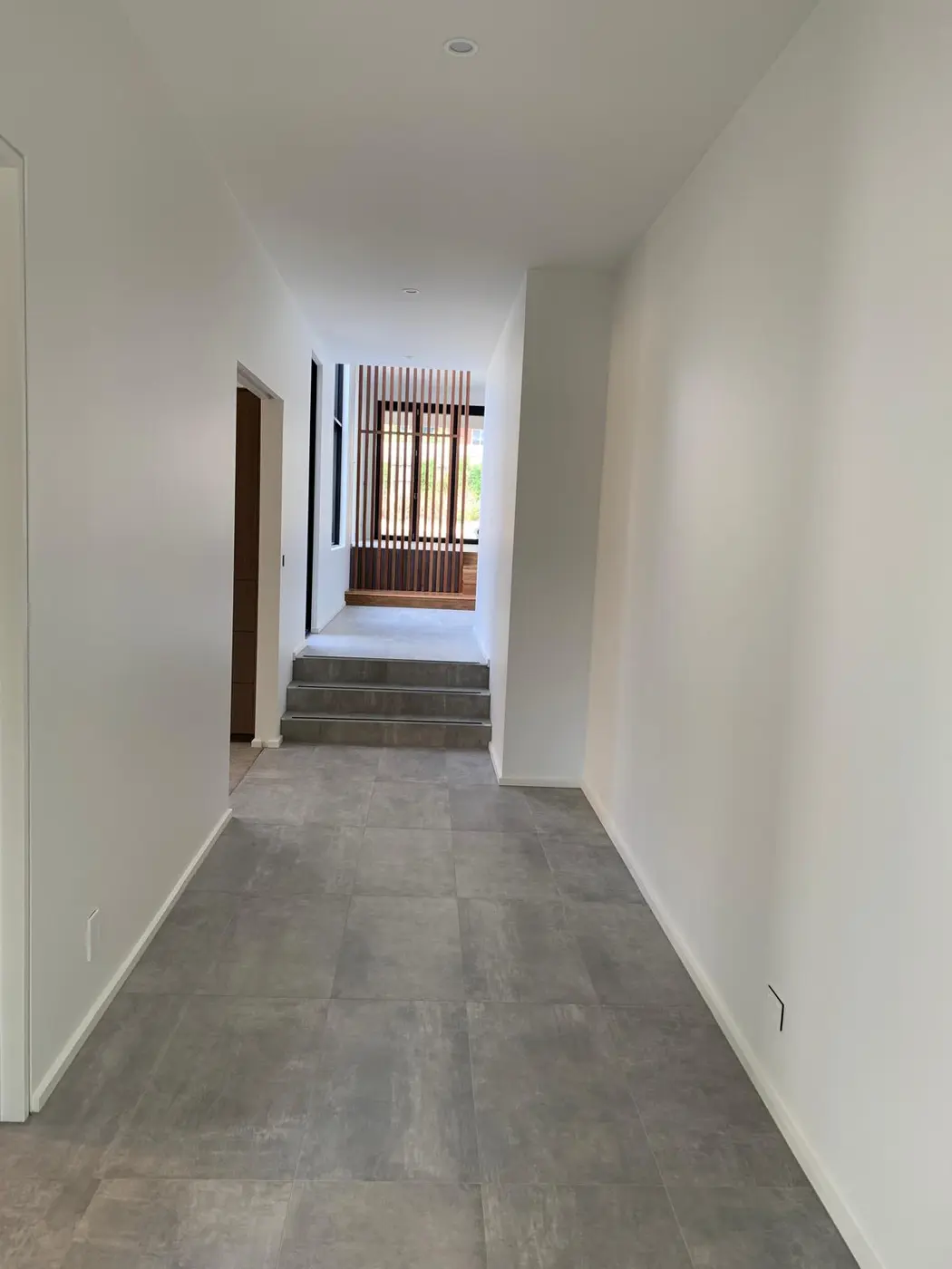 Clean hallway wall and trim finish