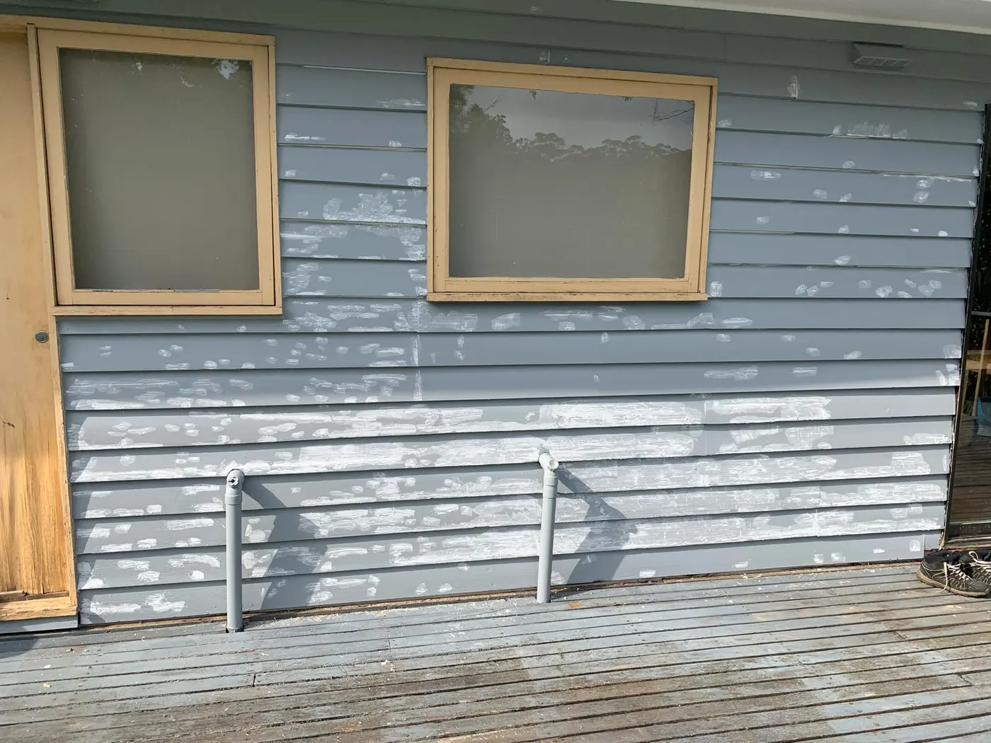 Weatherboard house prepared for repainting